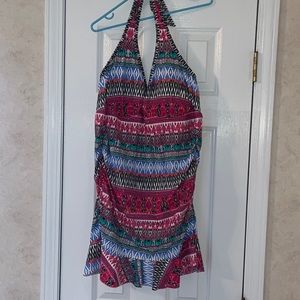 Kenneth Cole Reaction one piece with ruffle hem. Never worn.